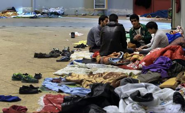 Germania: Guvernul va întocmi un proiect de lege privind centrele de azil până la finalul lui 2015