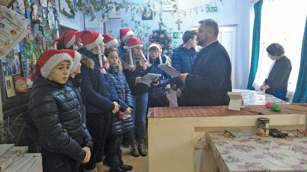 Daruri pentru deţinuţi şi copii orfani din partea tinerilor ortodocși din Tur