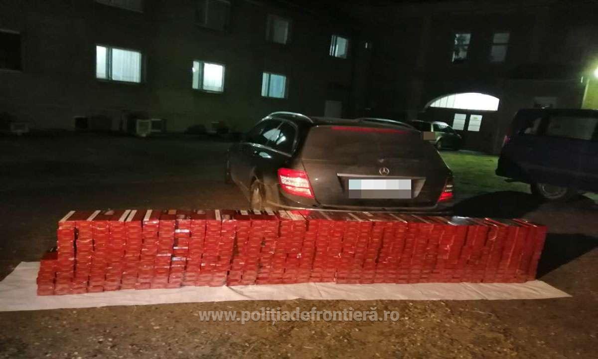 FOTOGALERIE. Contrabandist PRINS  pe CENTURĂ. Avea MII  de pachete de țigări