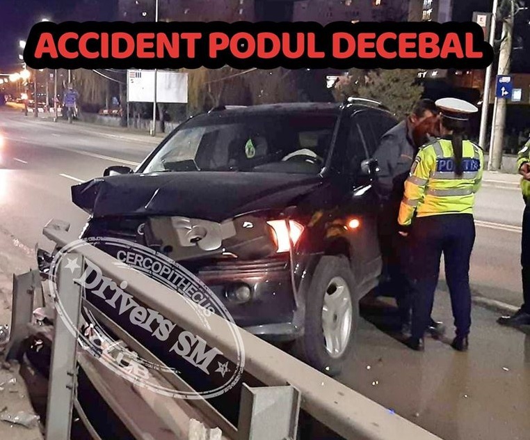 FOTO. ACCIDENT. Un şofer BEAT şi-a "PARCAT" maşina în parapetul de pe podul Golescu. Acum are dosar penal