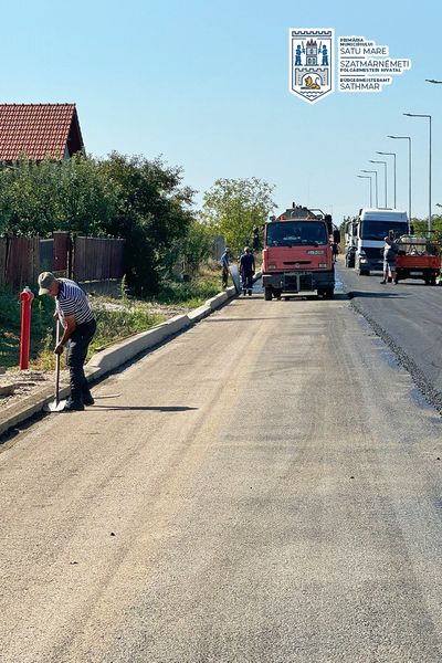 FOTO. Se asfalteaza strada Grădinarilor din municipiul Satu Mare.