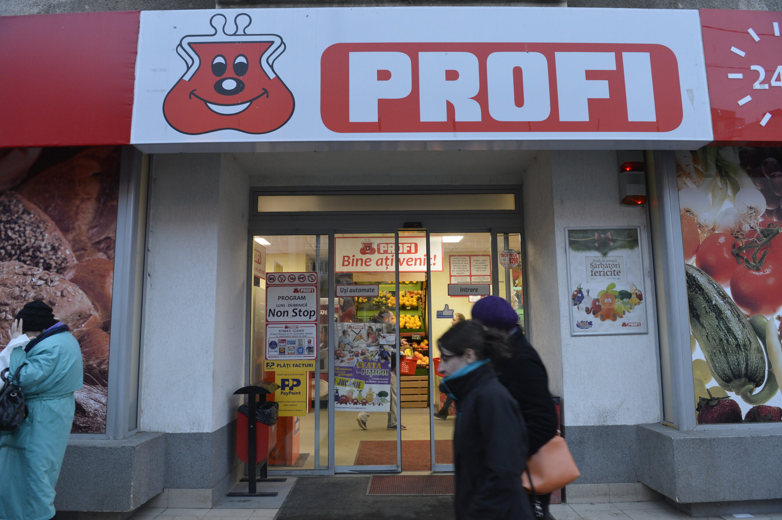 Giganții se mânâncă între ei. Consiliul Concurenței a autorizat condiționat preluarea Profi  de către Mega Image